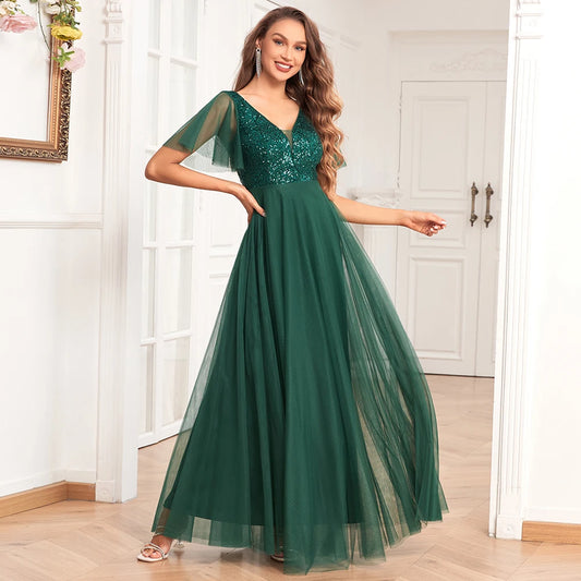 Robe de soirée à paillette verte